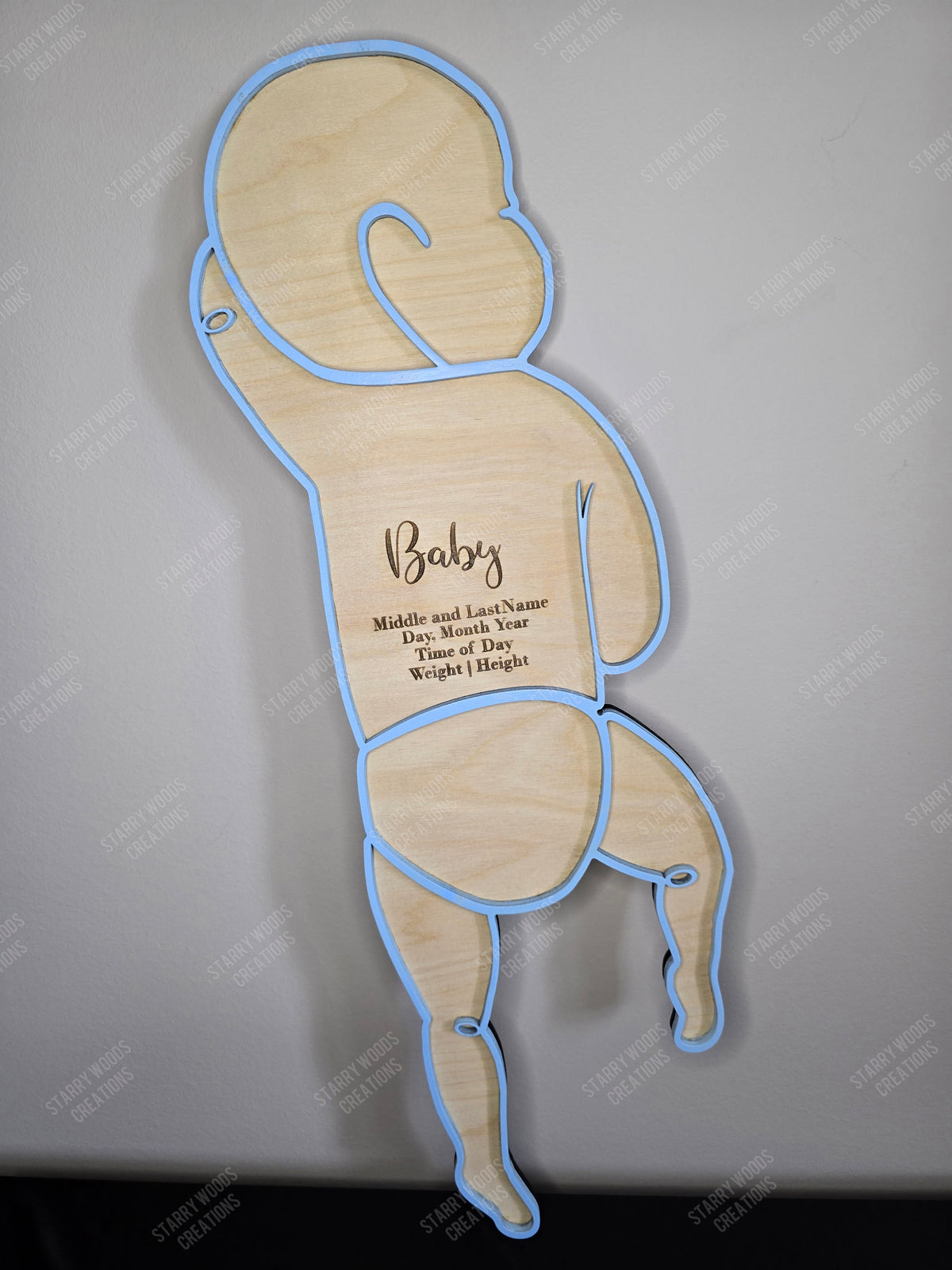 Wooden tummy lying baby silhouette with engraving space that can be cistomized with birth stats. Handmade in Ontario, perfect as a keepsake or for gifting.